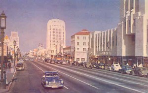 Looking East on Wilshire (circa 1960). El Rey Theatre on left. Chrome postcard. Source: Unknown.